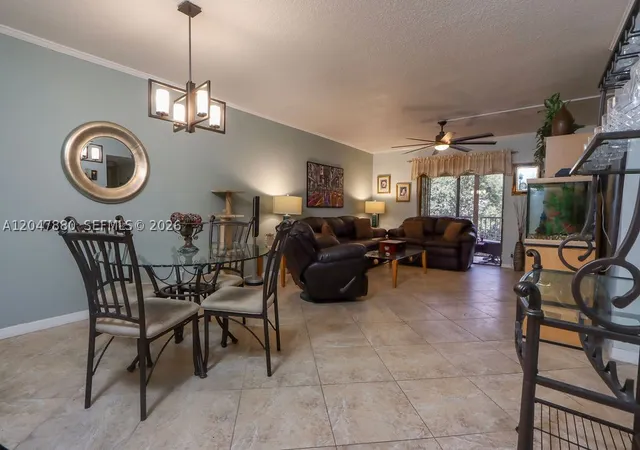 Photo 3 of Condo for sale at 3575 Broken Woods Dr #303, Coral Springs, FL 33065 | MLS# A12047880 | Listing updated on 2026-08-26