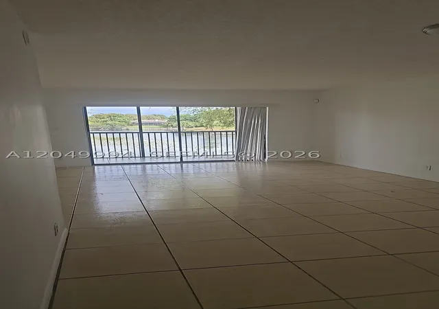 Photo 2 of Sale Pending at 9022 Nw 28th Dr #2-202, Coral Springs, FL 33065 | MLS# A12049994 | Listing updated on 2026-08-19