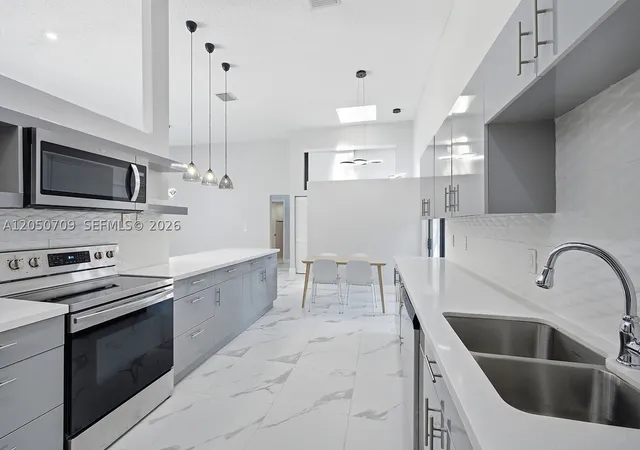 Photo 3 of Single family home for sale at 605 Leslie Dr, Hallandale Beach, FL 33009 | MLS# A12050709 | Listing updated on 2026-08-11