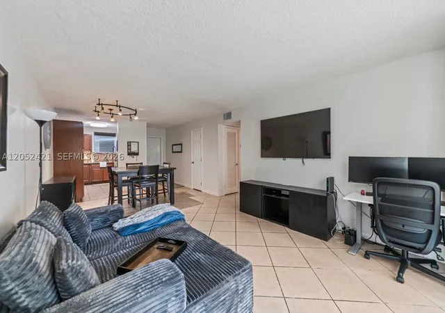 Photo 1 of Condo for sale at 1400 Tallwood Ave #107, Hollywood, FL 33021 | MLS# A12052421 | Listing updated on 2026-10-08