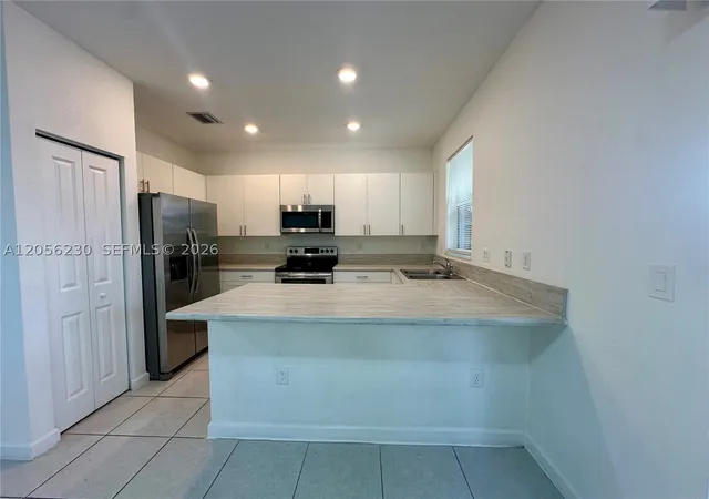 Photo 3 of Townhouse for sale at 2737 Se 17th St, Homestead, FL 33035 | MLS# A12056230 | Listing updated on 2026-10-03