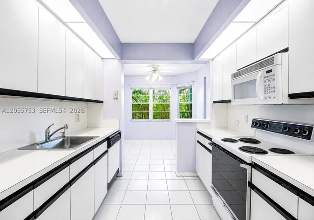 Photo 3 of Condo for sale at 12500 Sw 5th Ct #311M, Pembroke Pines, FL 33027 | MLS# A12055753 | Listing updated on 2026-10-07