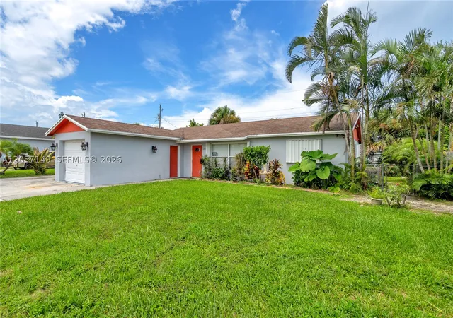 Photo 3 of Single family home for sale at 1320 W 26th Ct, Riviera Beach, FL 33404 | MLS# A12057140 | Listing updated on 2026-08-11