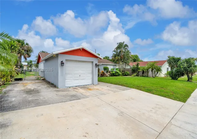 Photo 3 of Single family home for sale at 1320 W 26Th Ct, Riviera Beach, FL 33404 | MLS# A12057140 | Listing updated on 2026-08-11
