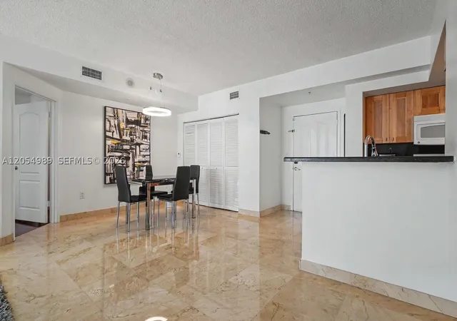 Photo 2 of Condo for sale at 5085 Nw 7th St #906, Miami, FL 33126 | MLS# A12054989 | Listing updated on 2026-09-28