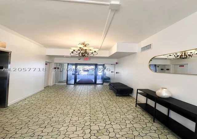 Listing Photo 1 - Condo for sale in building located at 1465 Ne 123Rd St, Miami, FL 33161 - Unit #609