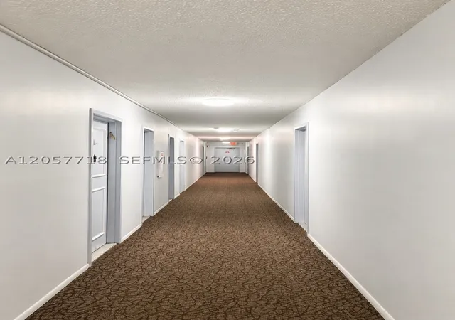 Listing Photo 4 - Condo for sale in building located at 1465 Ne 123Rd St, Miami, FL 33161 - Unit #609