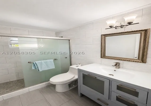 Photo 3 of Single family home for sale at 5651 Ne 9th Ave, Oakland Park, FL 33334 | MLS# A12058305 | Listing updated on 2026-08-04