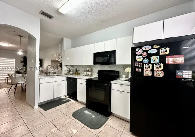 Photo 2 of Condo for sale at 5640 Nw 115th Ct #206, Doral, FL 33178 | MLS# A12057943 | Listing updated on 2026-08-26