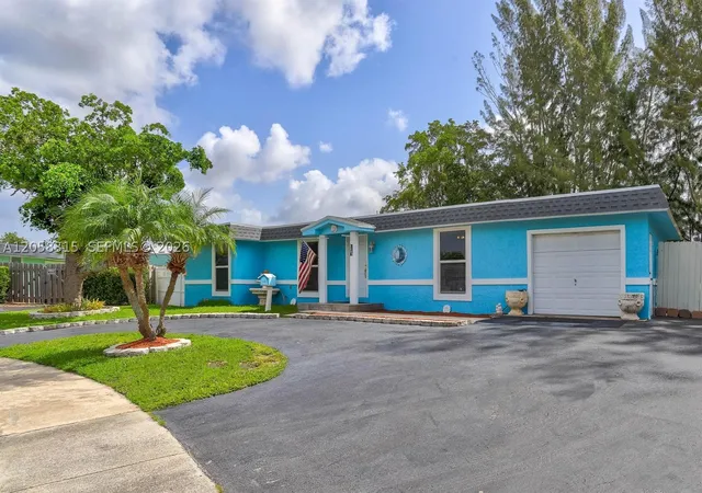 Photo 3 of Sale Pending at 6605 Nw 80th Ct, Tamarac, FL 33321 | MLS# A12058315 | Listing updated on 2026-07-29