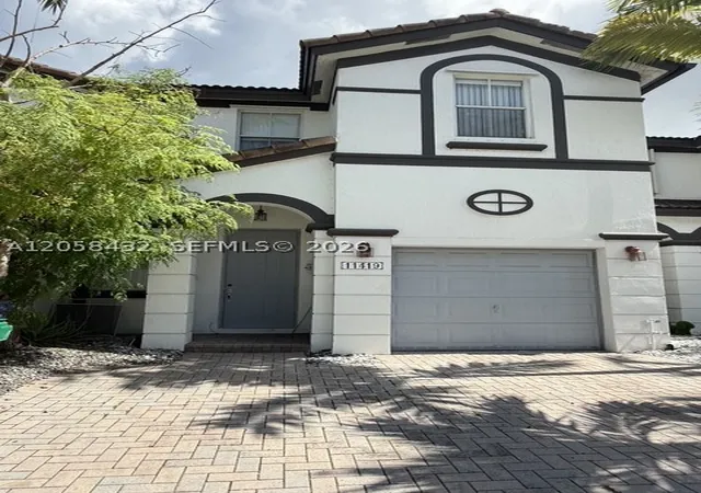 Photo 1 of Townhouse for sale at 11419 Nw 76th Ter, Doral, FL 33178 | MLS# A12058432 | Listing updated on 2026-08-20