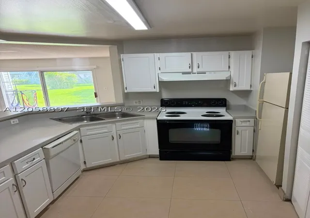 Photo 2 of Condo for sale at 3461 Nw 44th St #102, Oakland Park, FL 33309 | MLS# A12058897 | Listing updated on 2026-10-02