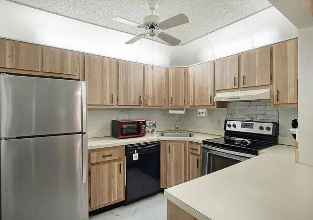 4th image of 5930 Whispering Pine Wy #C-2, Greenacres, FL 33463 | MLS# B26055960