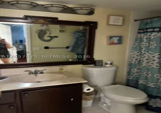 3rd image of 2450 Deer Creek Country Club Blvd #203-B, Deerfield Beach, FL 33442 | MLS# A12057675