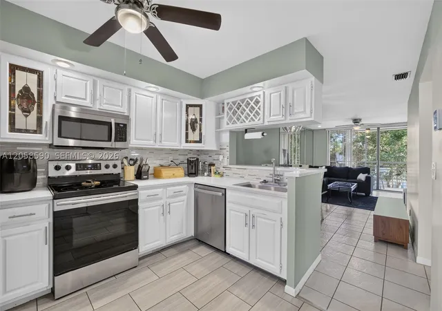 Photo 1 of Condo for sale at 7653 Nw 79Th Ave #312, Tamarac, FL 33321 | MLS# A12058590 | Listing updated on 2026-10-09