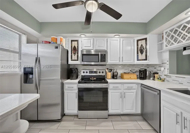 Photo 2 of Condo for sale at 7653 Nw 79Th Ave #312, Tamarac, FL 33321 | MLS# A12058590 | Listing updated on 2026-10-09