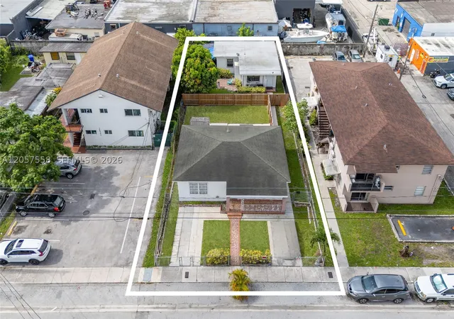 Photo 1 of Multi family home for sale at 2624 Nw 24th St, Miami, FL 33142 | MLS# A12057558 | Listing updated on 2026-10-09