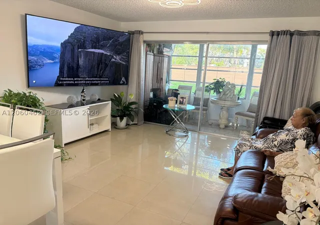 Photo 3 of Condo for sale at 8814 W Mcnab Rd #103, Tamarac, FL 33321 | MLS# A12060462 | Listing updated on 2026-07-31