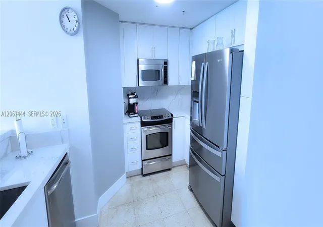 Photo 4 of Condo for sale at 7910 W Harbor Island Dr #708, North Bay Village, FL 33141 | MLS# A12061444 | Listing updated on 2026-08-25