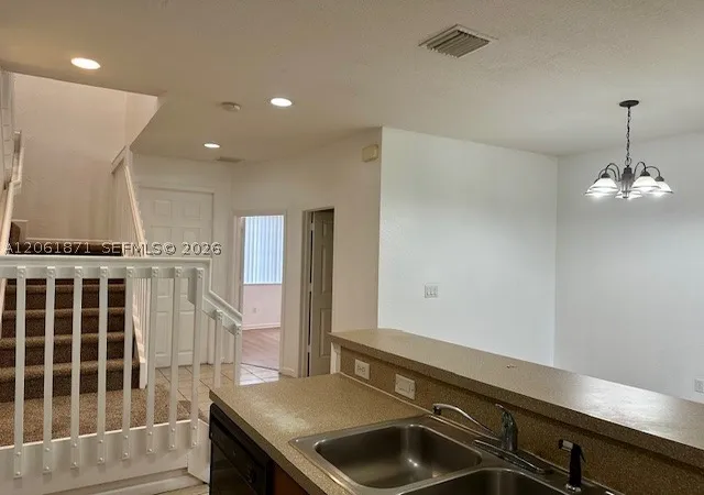 Photo 4 of Townhouse for sale at 1203 Abaco Ln, Riviera Beach, FL 33404 | MLS# A12061871 | Listing updated on 2026-07-30