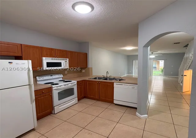 Photo 1 of Condo for sale at 8811 S Isles Cr #8811, Tamarac, FL 33321 | MLS# A12063091 | Listing updated on 2026-08-05