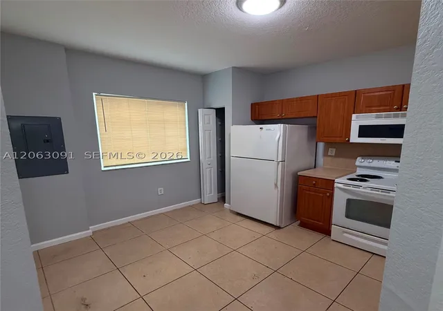 Photo 2 of Condo for sale at 8811 S Isles Cr #8811, Tamarac, FL 33321 | MLS# A12063091 | Listing updated on 2026-08-05