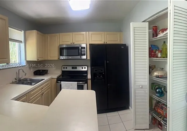 Photo 2 of Condo for sale at 3500 Briar Bay Blvd #106, West Palm Beach, FL 33411 | MLS# A12063564 | Listing updated on 2026-10-06