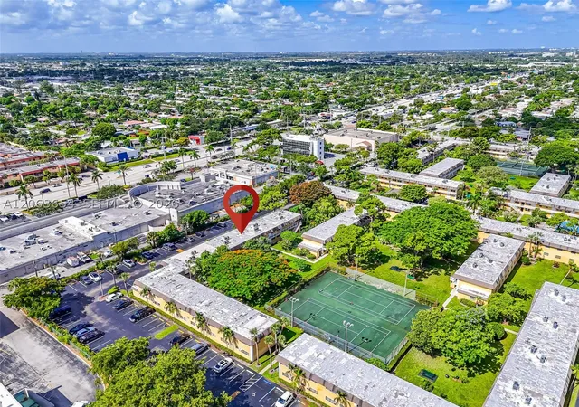 Listing Photo 1 - Condo for sale in building located at 5168 Ne 6Th Ave, Oakland Park, FL 33334 - Unit #416