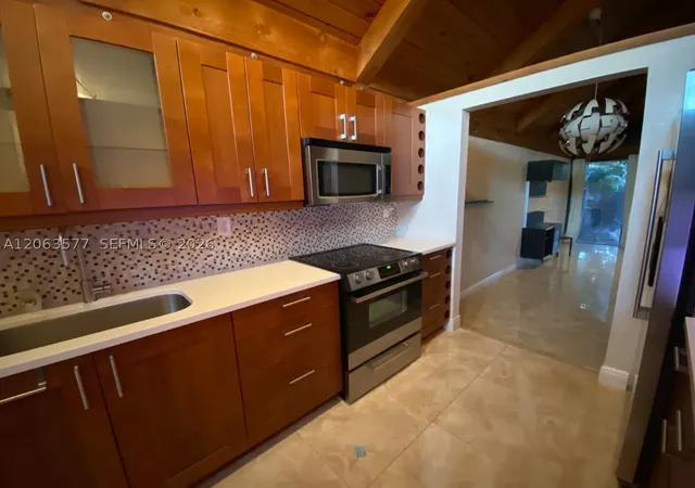Photo 3 of Townhouse for sale at 485 N University Dr #3-6, Plantation, FL 33324 | MLS# A12063577 | Listing updated on 2026-08-02