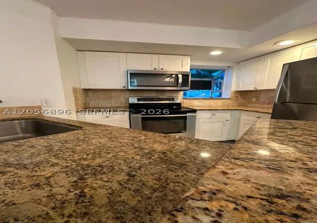 Photo 3 of Condo for sale at 3330 N Pinewalk Dr N #1611, Margate, FL 33063 | MLS# A12056896 | Listing updated on 2026-08-02