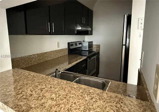 Photo 4 of Condo for sale at 1032 Twin Lakes Dr #21-G, Coral Springs, FL 33071 | MLS# A12065012 | Listing updated on 2026-08-24