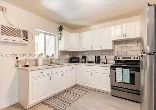 Photo 3 of Multi family home for sale at 20 Se 13th Ter, Dania Beach, FL 33004 | MLS# A12065255 | Listing updated on 2026-10-06
