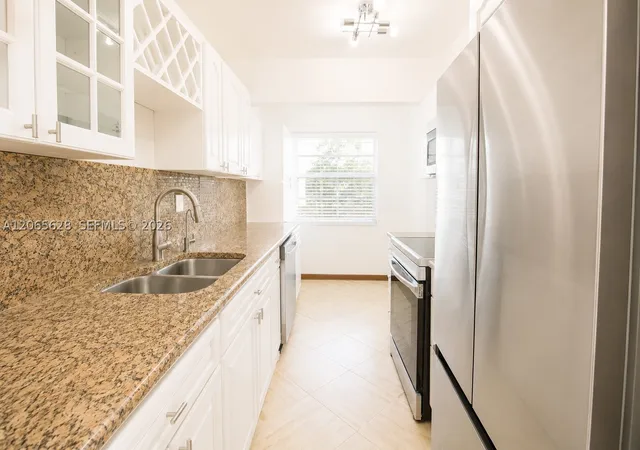 Photo 1 of Condo for sale at 3120 N Pine Island Rd #403, Sunrise, FL 33351 | MLS# A12065628 | Listing updated on 2026-10-06