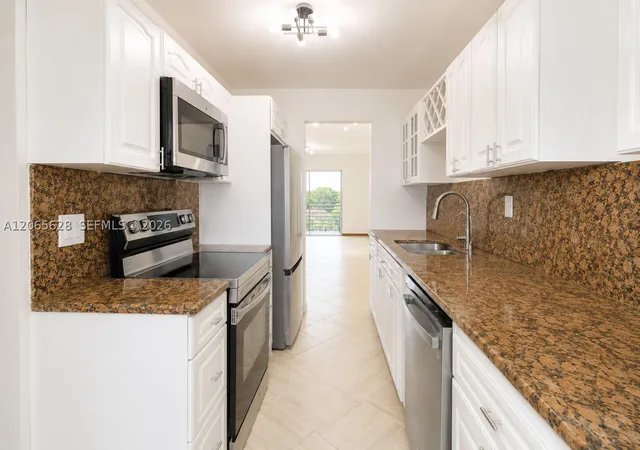 Photo 2 of Condo for sale at 3120 N Pine Island Rd #403, Sunrise, FL 33351 | MLS# A12065628 | Listing updated on 2026-10-06