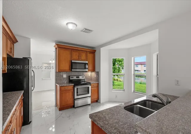 Photo 4 of Single family home for sale at 1720 Ne 35 Avenue, Homestead, FL 33033 | MLS# A12065863 | Listing updated on 2026-08-05