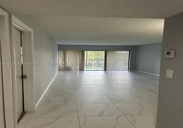 Photo 2 of Condo for sale at 230 Lakeview Dr #209, Weston, FL 33326 | MLS# A12067010 | Listing updated on 2026-08-07