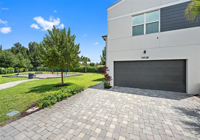 Photo 2 of Townhouse for sale at 1616 Lindley St, Mangonia Park, FL 33407 | MLS# A12067408 | Listing updated on 2026-08-07