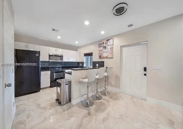 Townhouse for sale at 615 Nw 10Th Ter #1, Fort Lauderdale, FL 33311 | MLS# A12067574