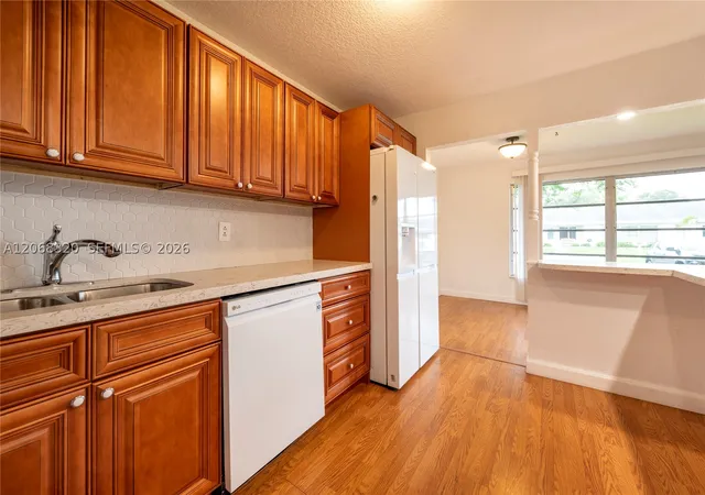Photo 3 of Condo for sale at 8555 Nw 10th St #B106, Plantation, FL 33322 | MLS# A12068320 | Listing updated on 2026-10-04