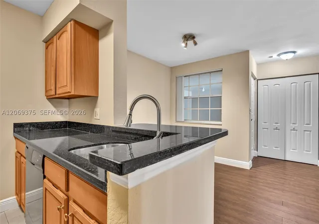 Photo 3 of Condo for sale at 2850 N Oakland Forest Dr #208, Oakland Park, FL 33309 | MLS# A12069375 | Listing updated on 2026-08-24
