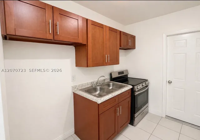 Photo 3 of Multi family home for sale at 1041 Nw 7th Ct, Hallandale Beach, FL 33009 | MLS# A12070723 | Listing updated on 2026-08-21