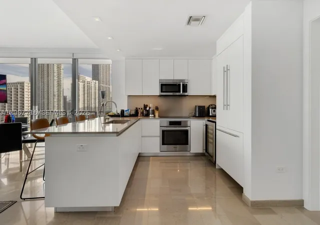 Photo 1 of Condo for sale at 68 Se 6Th St #2101, Miami, FL 33131 | MLS# A12062715 | Listing updated on 2026-08-14