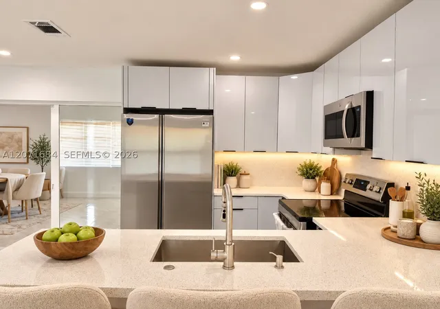 Photo 3 of Single family home for sale at 1240 W 26th Ct, Riviera Beach, FL 33404 | MLS# A12071684 | Listing updated on 2026-10-08
