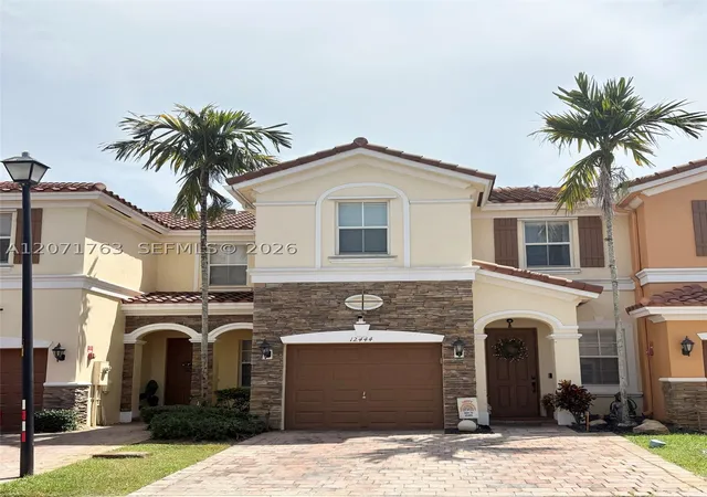 Photo 1 of Townhouse for sale at 12444 Emerald Creek Ct, Plantation, FL 33325 | MLS# A12071763 | Listing updated on 2026-10-09