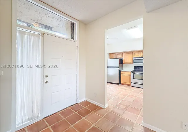 Listing Photo 4 - Condo for sale in building located at 10524 Nw 10Th St, Pembroke Pines, FL 33322 - Unit #A-125