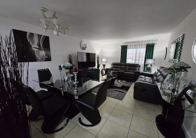Photo 1 of Condo for sale at 10001 W Atlantic Blvd #119, Coral Springs, FL 33071 | MLS# A12072848 | Listing updated on 2026-10-06