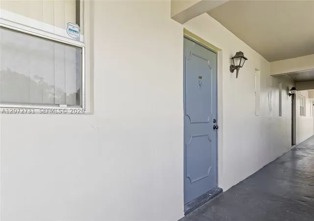 Listing Photo 2 - Condo for sale in building located at 7925 Fairview Dr, Tamarac, FL 33321 - Unit #105