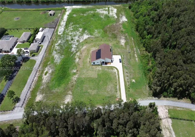 Photo 3 of Single family home for sale at 19860 Skyhawk Ln, Loxahatchee, FL 33470 | MLS# A12073550 | Listing updated on 2026-08-18