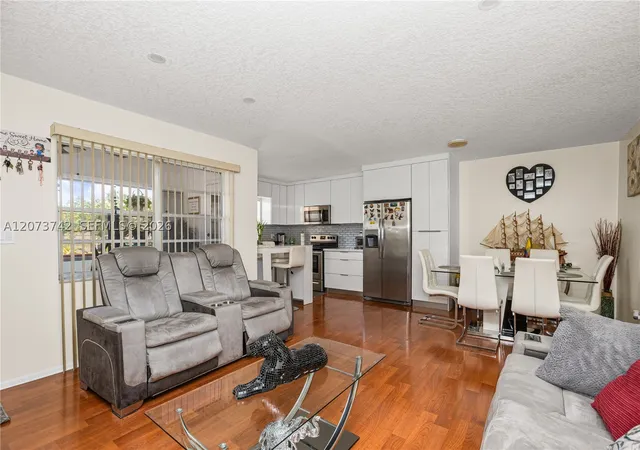Photo 1 of Condo for sale at 5300 Washington St #E209, Hollywood, FL 33021 | MLS# A12073742 | Listing updated on 2026-08-19