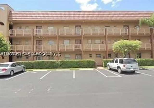 Listing Photo 1 - Condo for sale in building located at 9360 Sunrise Lakes Blvd, Sunrise, FL 33322 - Unit #302